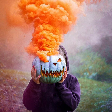smoke bomb orange smoke grenade in pumpkin