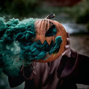 teal smoke bomb pumpkin halloween photoshoot